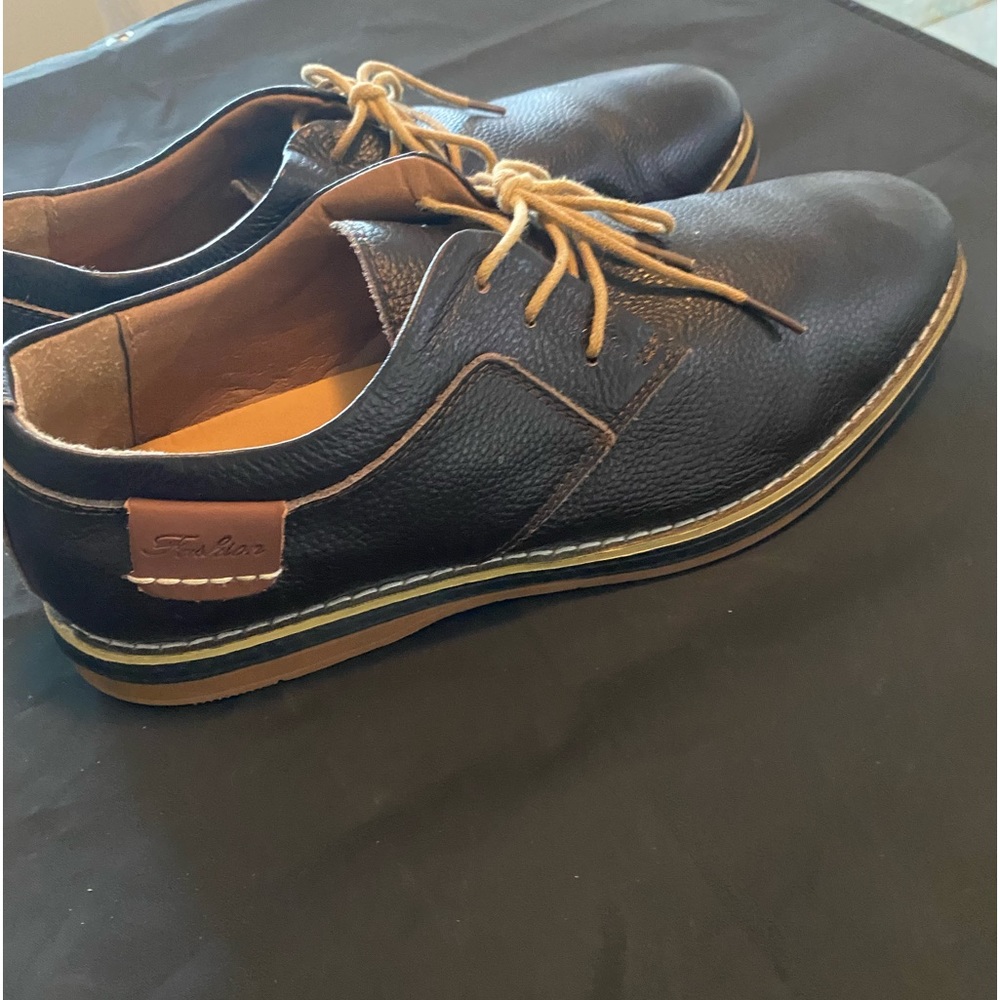 Men’s Brown Leather Shoes for dress or casual. Size 11.5 . Very lightly worn.